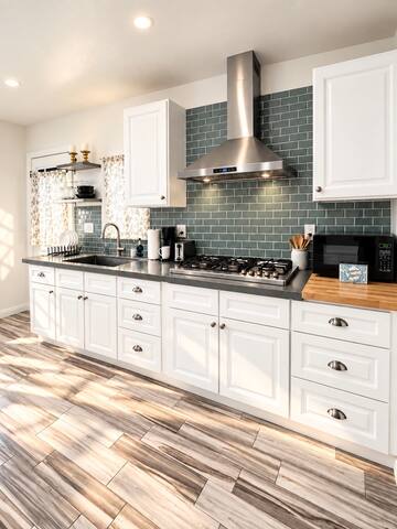1 Bedroom Guest House Villa - HV2 galley kitchen with stainless steel appliances